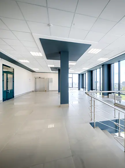 Bright modern office space with professional commercial painting by Coca Construction.