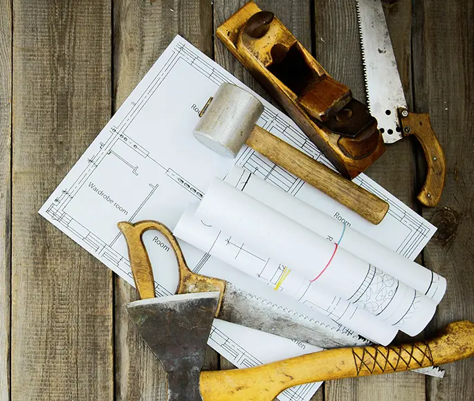 Construction blueprints and tools for general contracting projects in Spokane